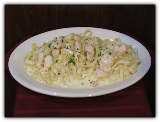 Fettuccini Al Gamberoni. Shrimp in Alfredo Sauce.