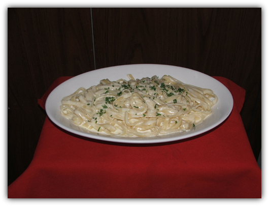 Fetuccini Alfredo pasta with cream sauce.