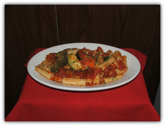 Rigatoni Primavera sauteed with fresh vegetables and tomato sauce.