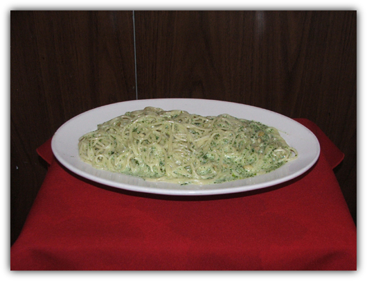 Spaghettini Al Pesto with green pesto sauce.