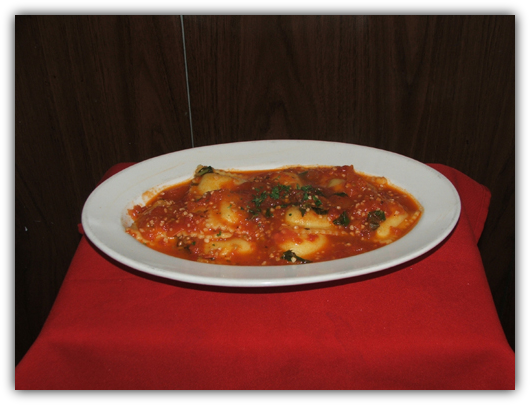 Ravioli Pomodoro. Stuffed beef or cheese with basil and tomato sauce.