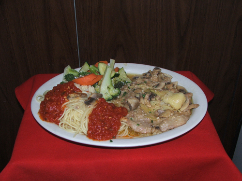 Maiale Papa Galo. Pork sauteed garlic, Marsala wine, artichokes and mushrooms.