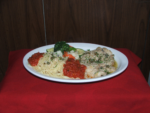 Maiale Al Limone. Pork sauteed in white wine, capers and lemon.