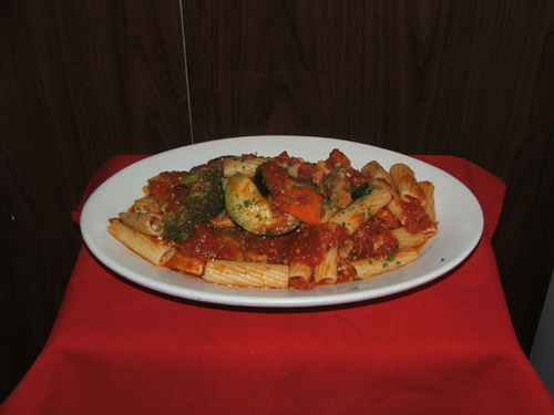 Rigatoni Primavera sauteed with fresh vegetables and tomato sauce.